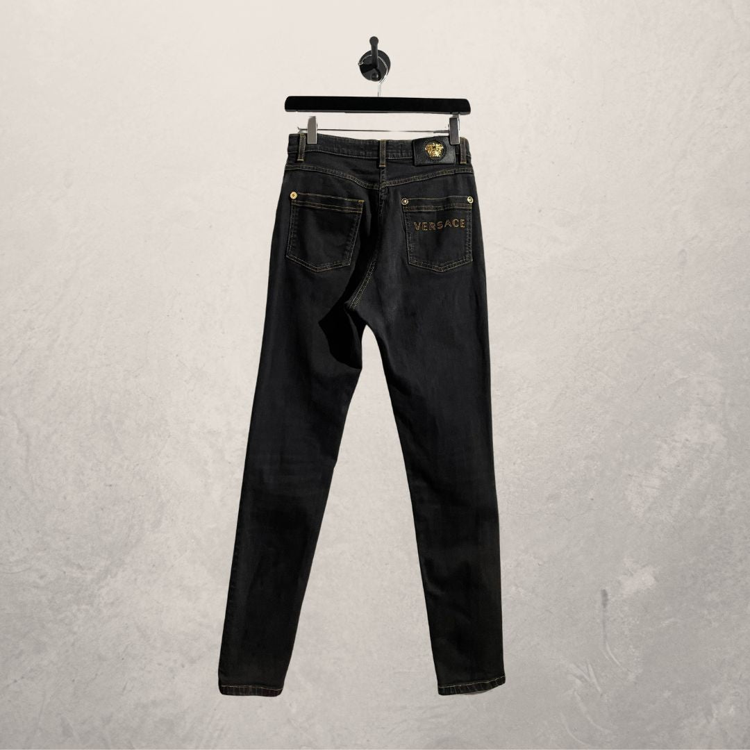 Vintage Versace zwart/gouden Medusa stretch denim broek met hoge taille 36/38