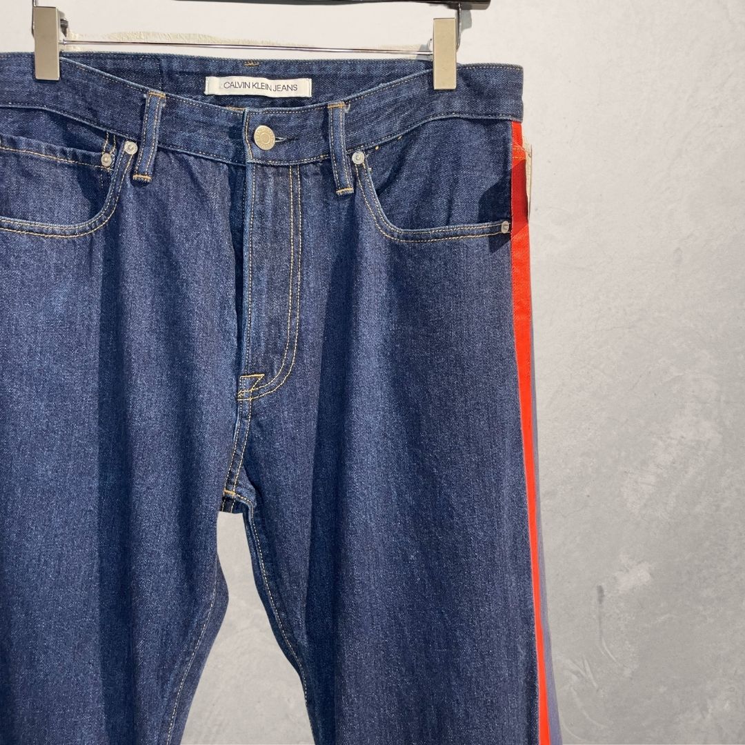 Calvin Klein Jeans by RAF SIMONS donkerblauwe denim rode streep 32x32