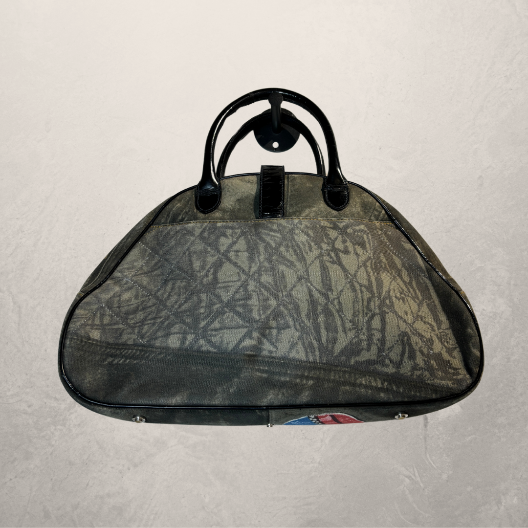 Dior blauwe 'Miss Diorella' speedwaytas - van Romae Studios