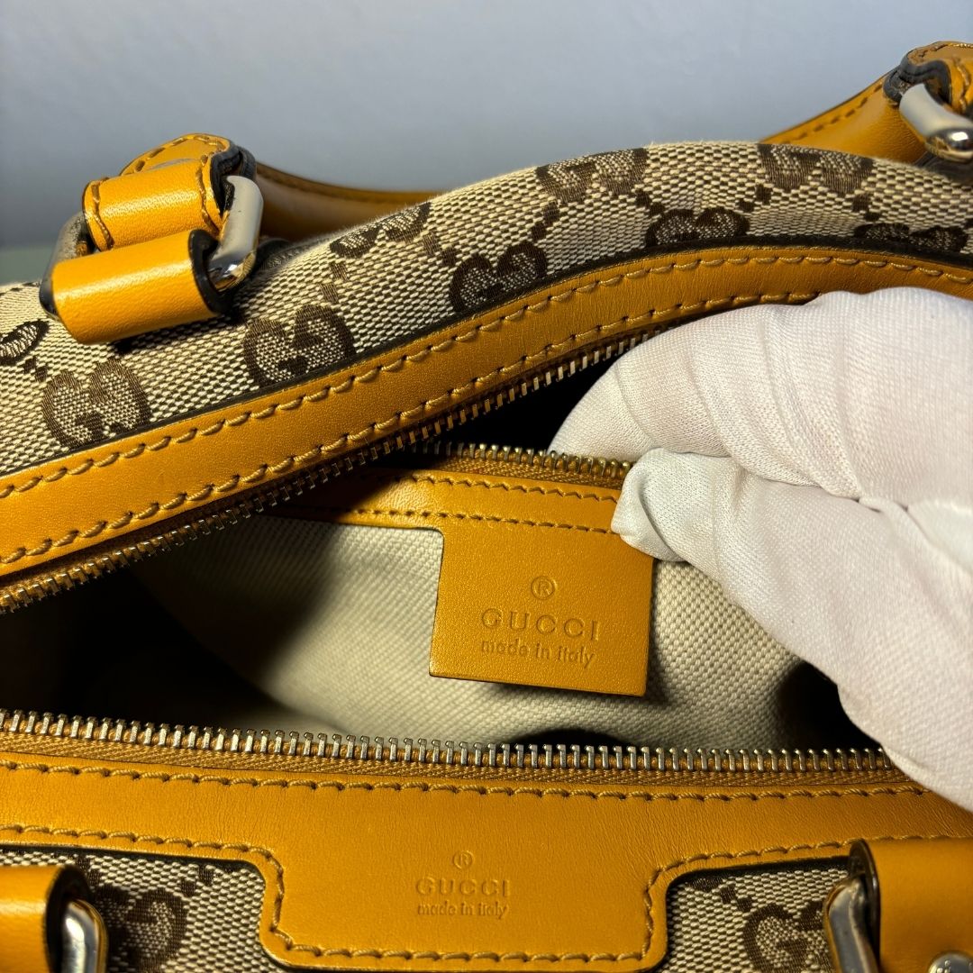 Gucci brown/yellow Boston bag - by Romae Studios