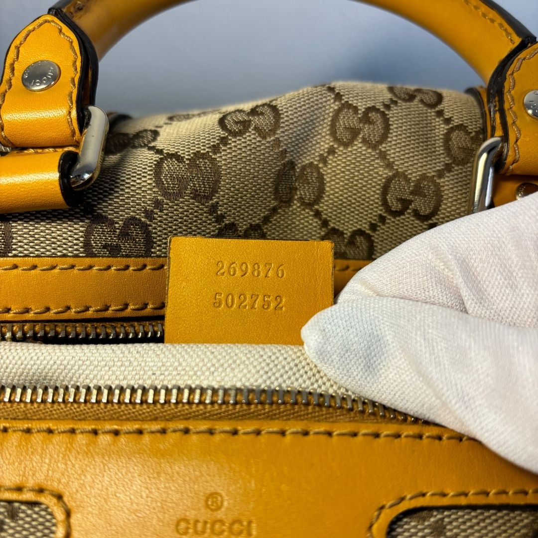 Gucci brown/yellow Boston bag - by Romae Studios