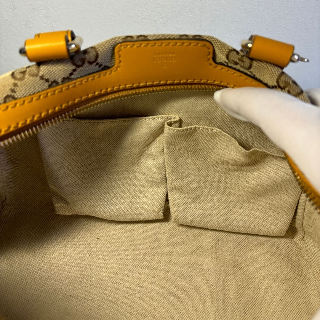 Gucci brown/yellow Boston bag - by Romae Studios