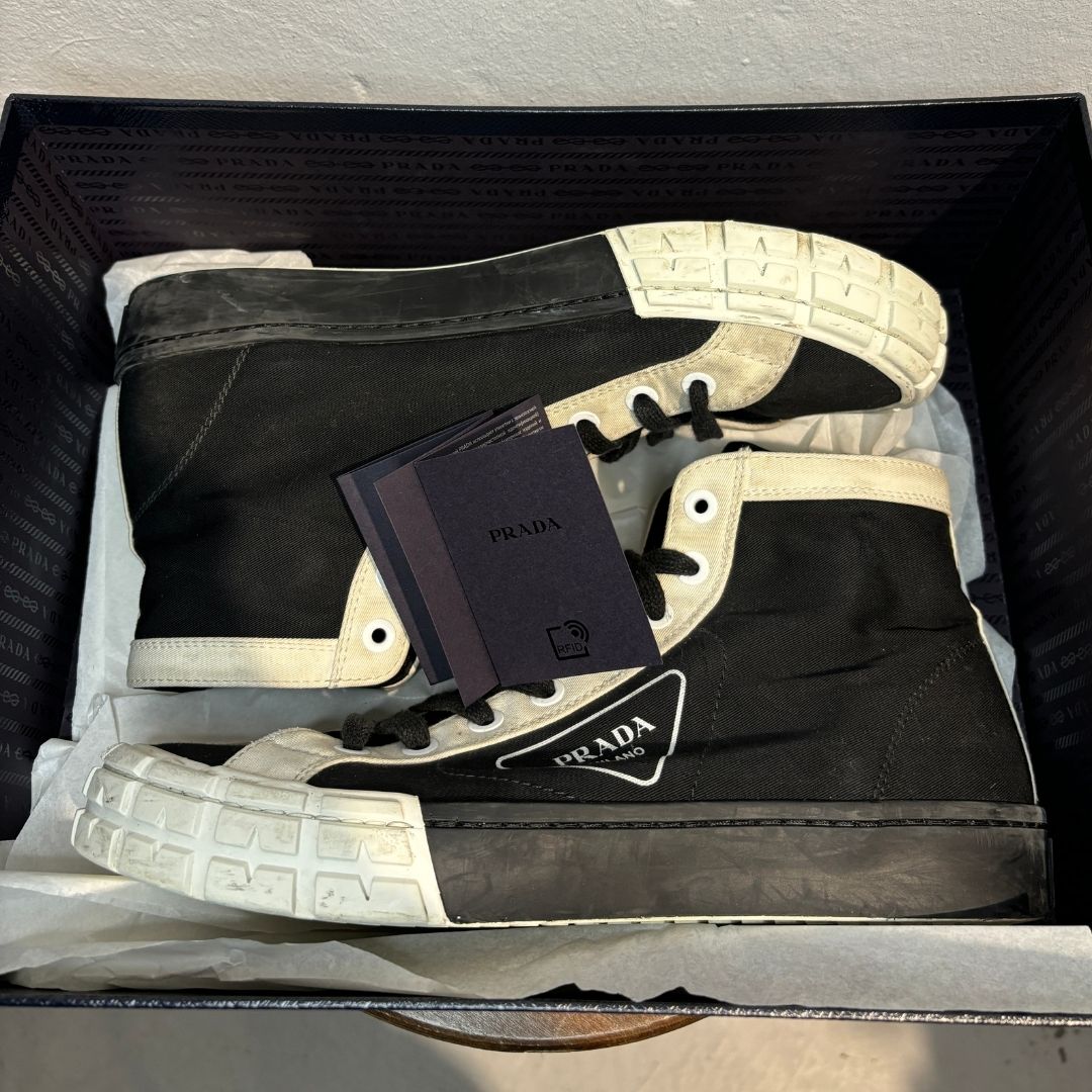 Prada black and white Wheel high-top logo sneakers 44