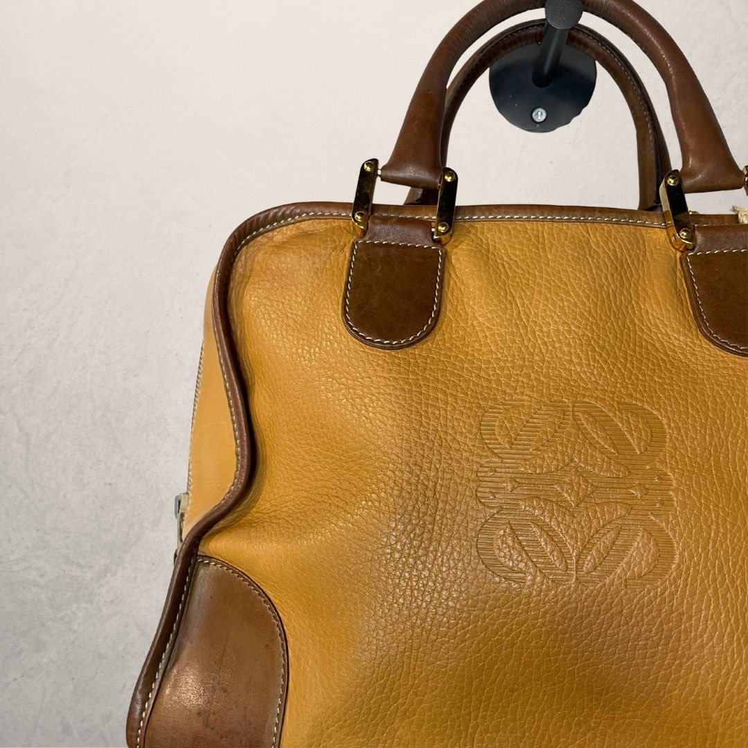 Vintage Loewe bruine en gele leren handtas met logo - van Romae Studios