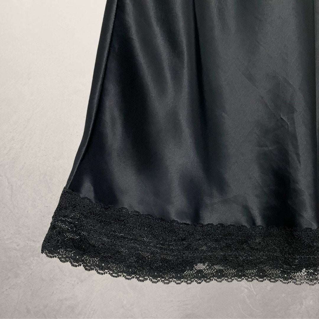 VINTAGE black glossy slip skirt SIZE MEDIUM