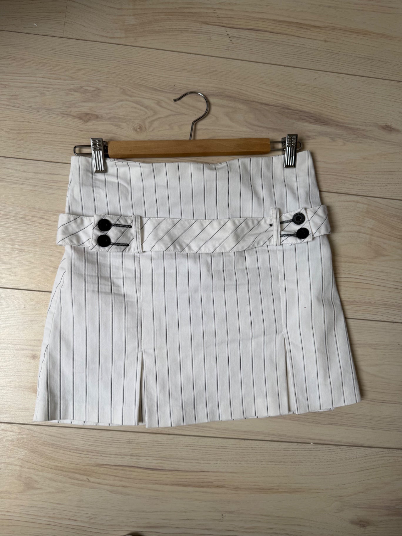 Morgan White with black pinstriped mini skirt S