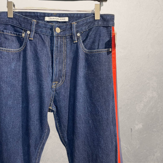 Calvin Klein Jeans by RAF SIMONS donkerblauwe denim rode streep 32x32