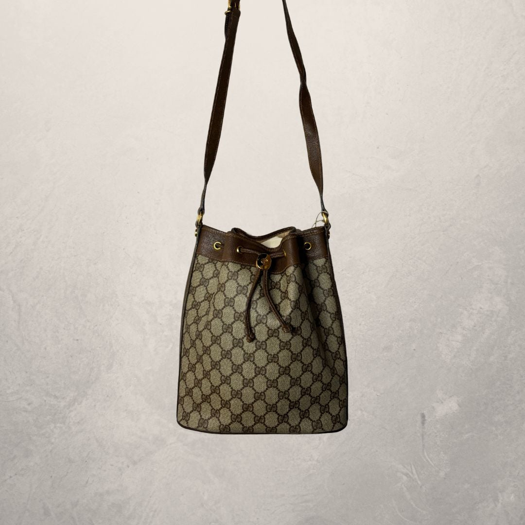 Gucci monogram bucket crossbody - by Romae Studios