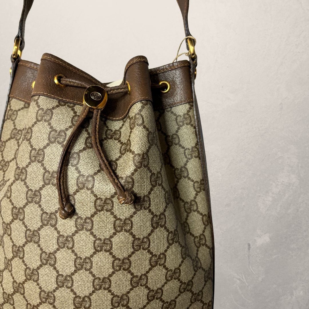 Gucci monogram bucket crossbody - by Romae Studios