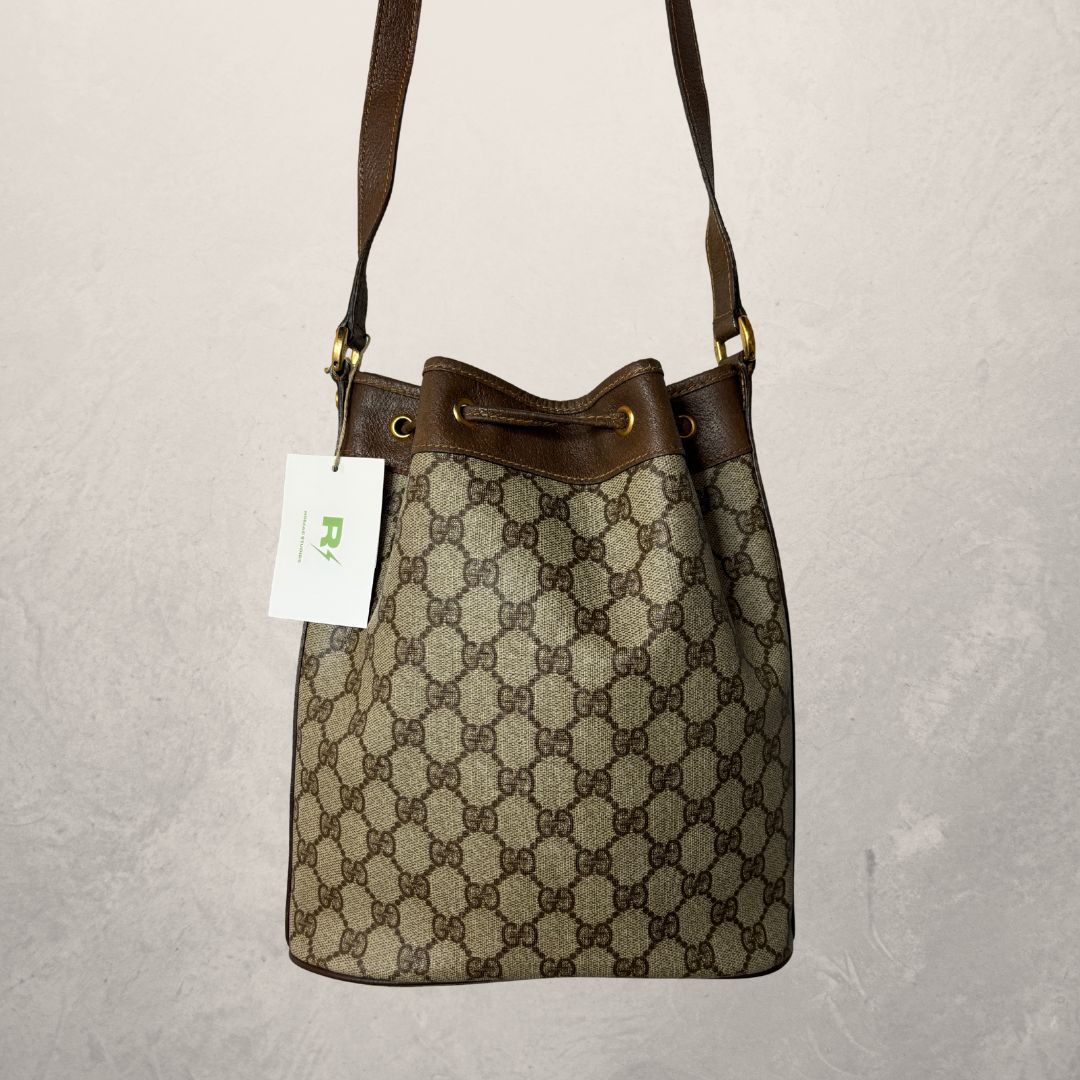 Gucci monogram bucket crossbody - by Romae Studios