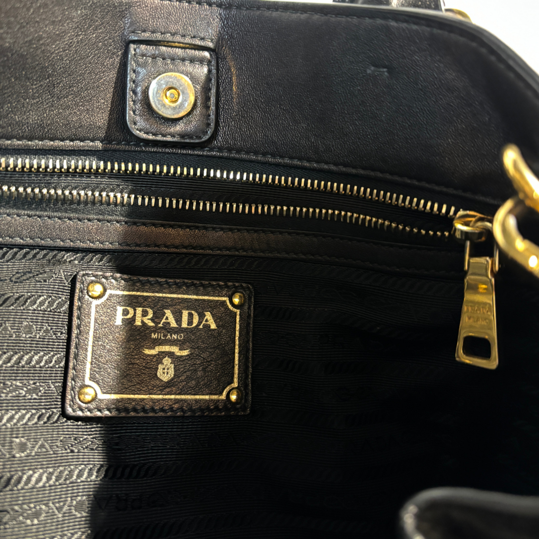 Prada black leather w/ gold hardware tote bag