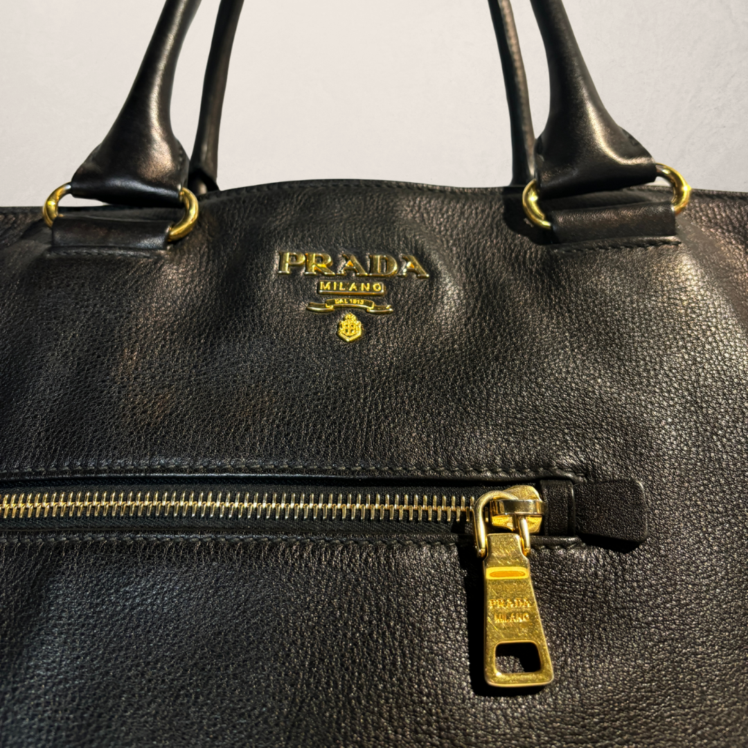 Prada black leather w/ gold hardware tote bag