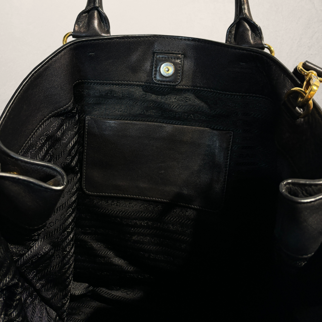 Prada black leather w/ gold hardware tote bag